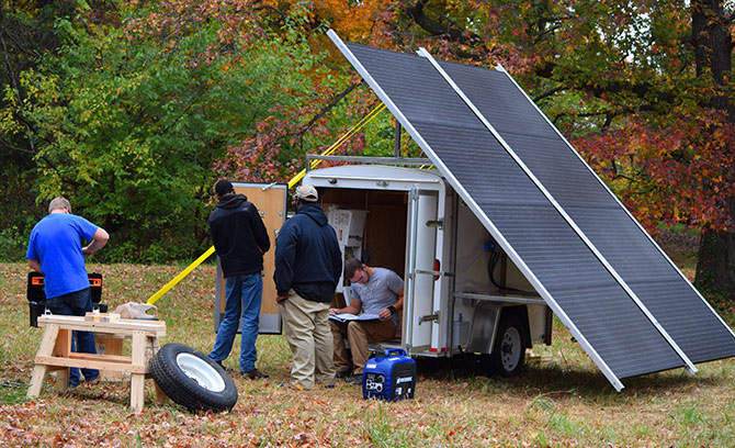 Students from Alfred State College, SUNY College of Technology install the Solar Array at the USNA
